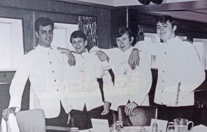 Four stewards on a cargo ship.